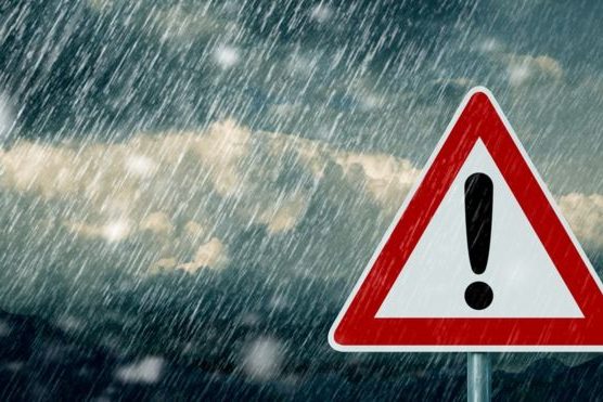 HEAVY-RAIN-LIVERPOOL rain sign board